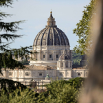 A view of the Vatican, as glimpse through the trees.